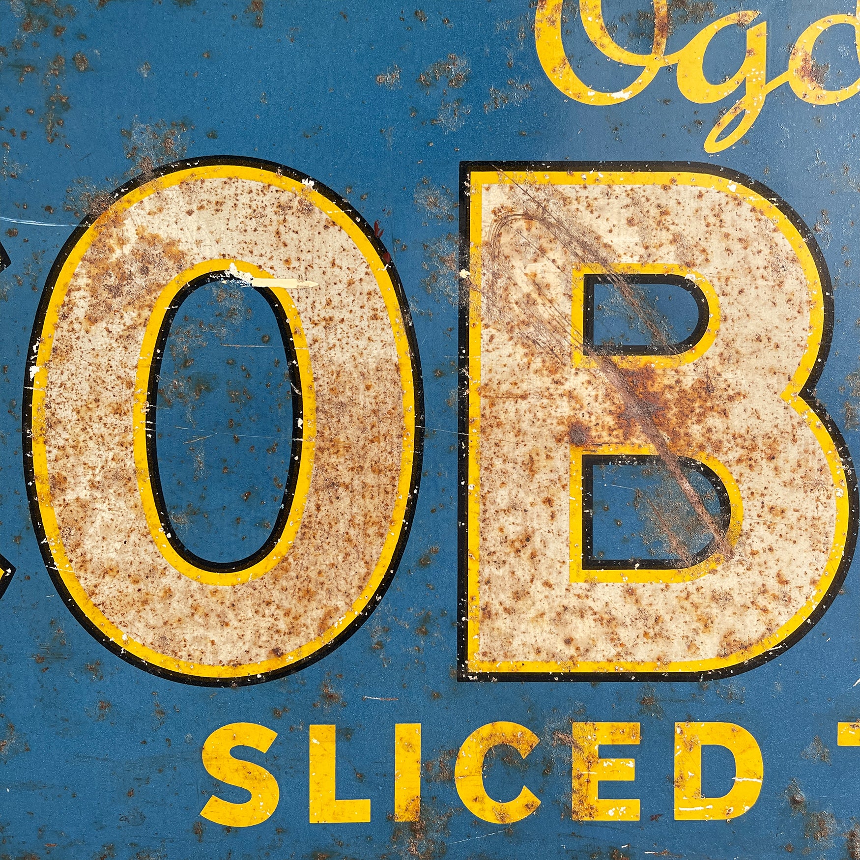 A 1930s Ogden's Cob Nut Sliced Tobacco Tin Sign. In a fantastic bright blue with yellow and black highlights around white type.warm yellow with dark blue type. - SHOP NOW - www.intovintage.co.uk