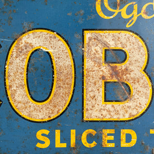 A 1930s Ogden's Cob Nut Sliced Tobacco Tin Sign. In a fantastic bright blue with yellow and black highlights around white type.warm yellow with dark blue type. - SHOP NOW - www.intovintage.co.uk