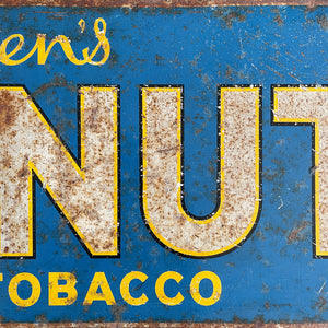 A 1930s Ogden's Cob Nut Sliced Tobacco Tin Sign. In a fantastic bright blue with yellow and black highlights around white type.warm yellow with dark blue type. - SHOP NOW - www.intovintage.co.uk