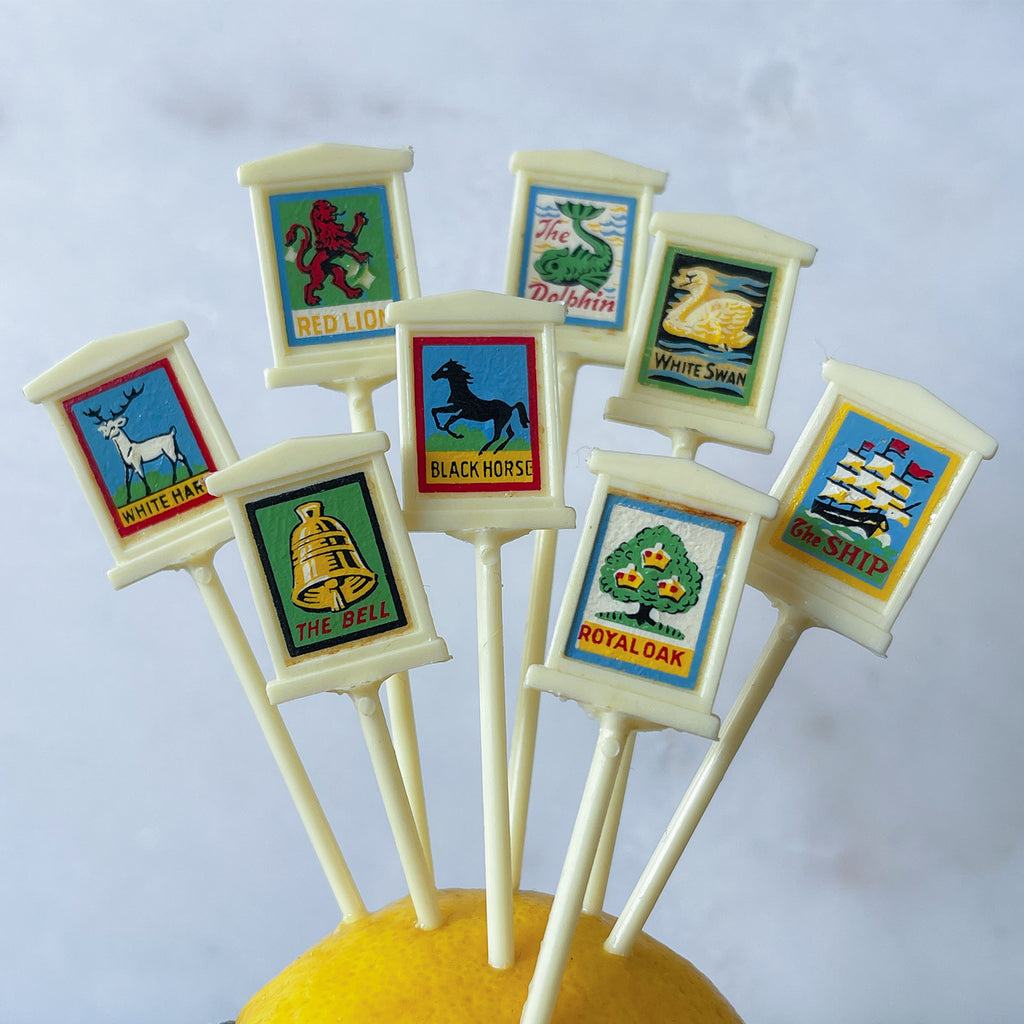 A set of 8 Vintage British Pub Sign Cocktail Sticks. Each shows a traditional Pub sign in bright vibrant colours. Will make your G&T look uber cool! - SHOP NOW - www.intovintage.co.uk