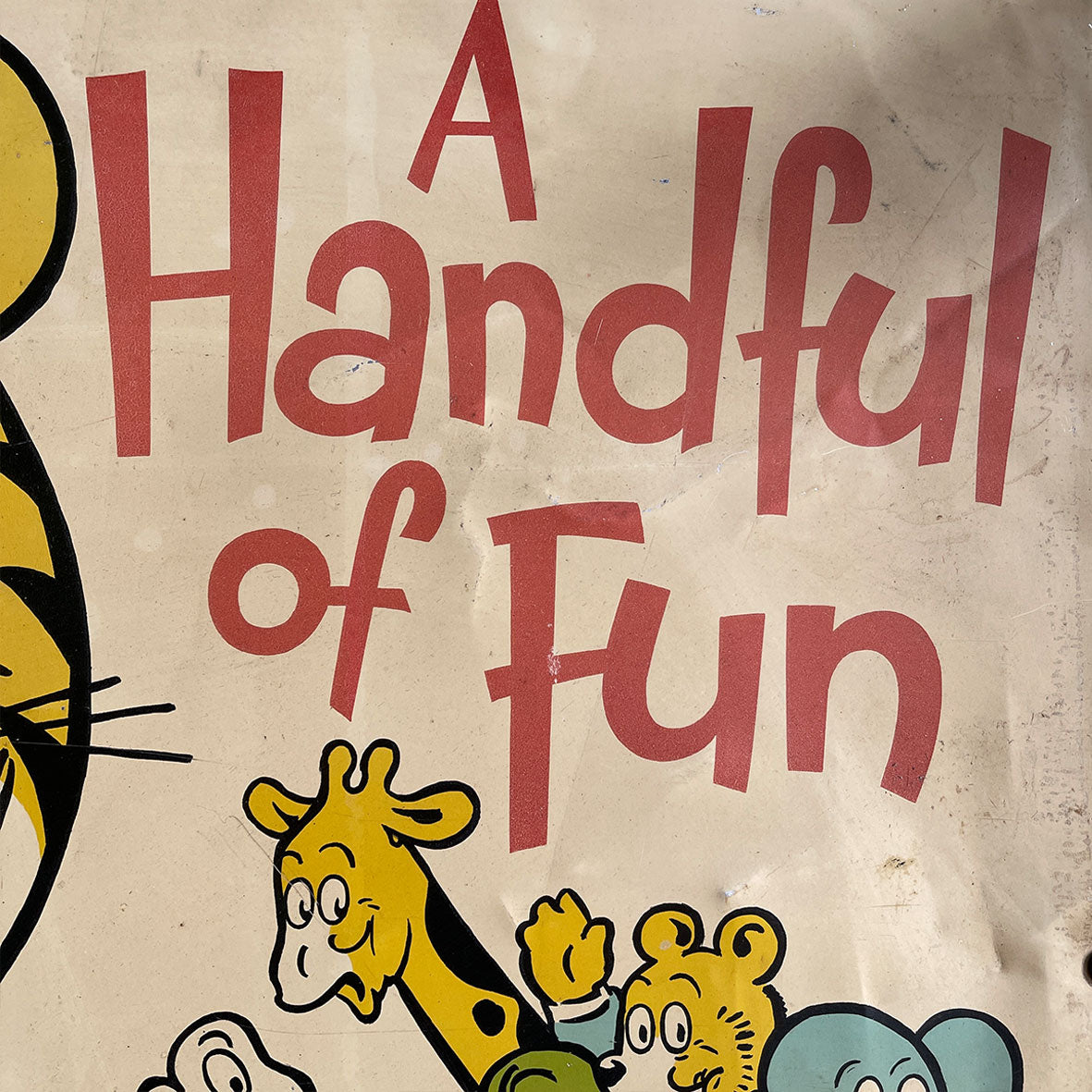 A Vintage Tin Comic Advertising Sign