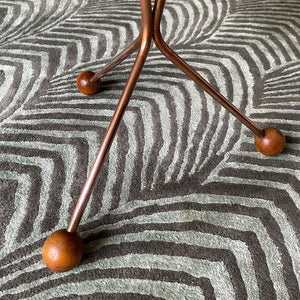 A mid century copper legged occasional table. Crafted from quality teak and copper. The slender copper legs finished in vey cool teak ball feet - SHOP NOW - www.intovintage.co.uk