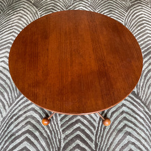 A mid century copper legged occasional table. Crafted from quality teak and copper. The slender copper legs finished in vey cool teak ball feet - SHOP NOW - www.intovintage.co.uk