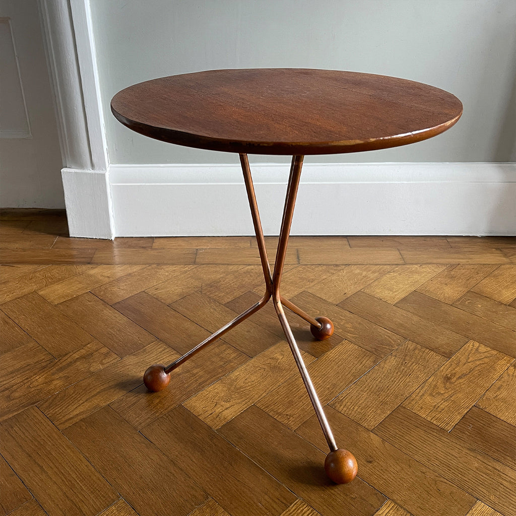 A mid century copper legged occasional table. Crafted from quality teak and copper. The slender copper legs finished in vey cool teak ball feet - SHOP NOW - www.intovintage.co.uk