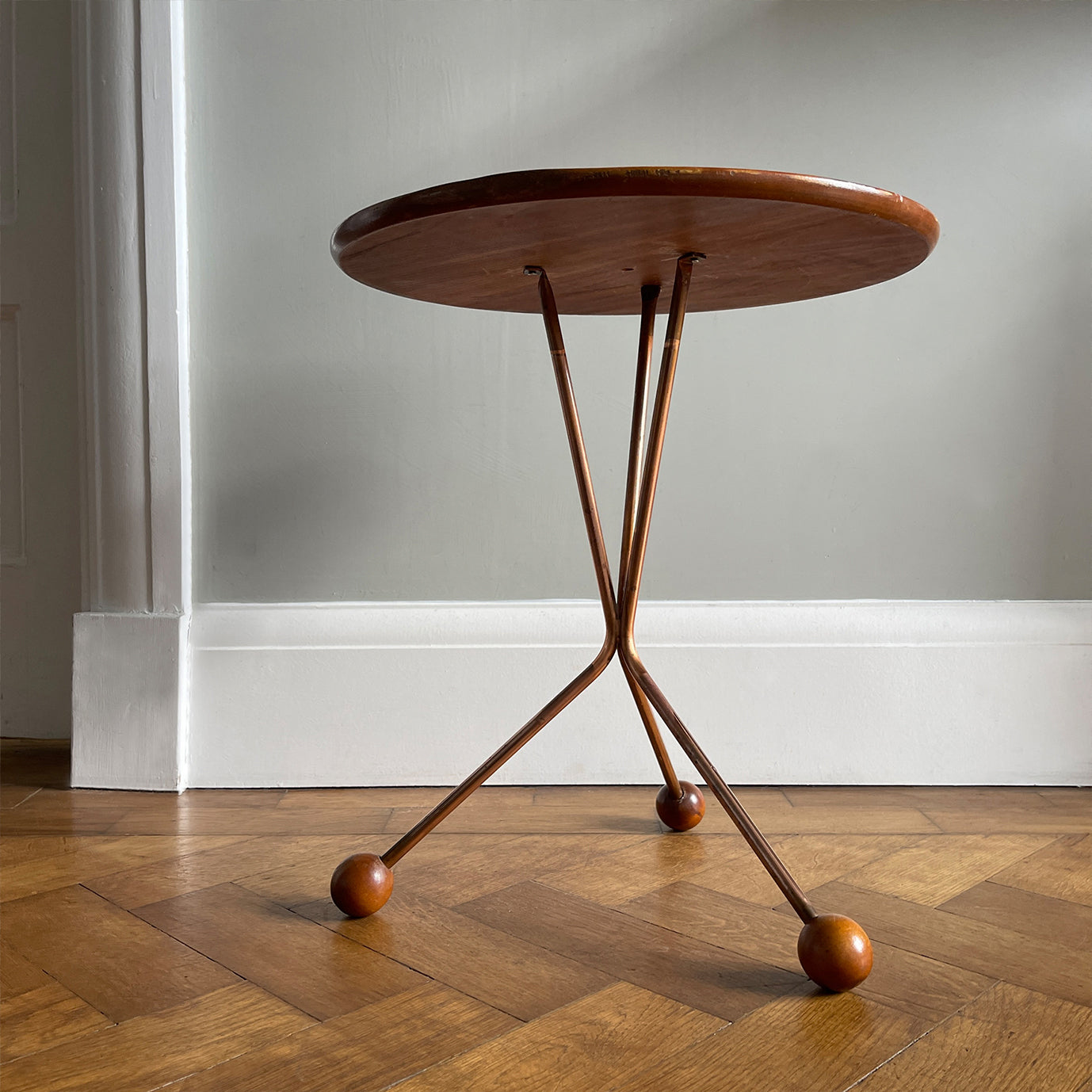 A mid century copper legged occasional table. Crafted from quality teak and copper. The slender copper legs finished in vey cool teak ball feet - SHOP NOW - www.intovintage.co.uk