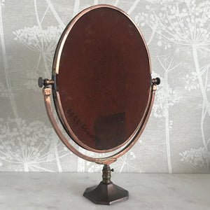 A very pretty Vintage Copper Shop Counter Mirror from an old Leigh on Sea haberdashery shop C.1930. The original mirror plate, that swivels in the frame, is bevelled and has a slight foxing on it. Great patina on the copper. Would look great in the bathroom or on the dressing table - SHOP NOW - www.intovintage.co.uk