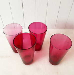 A beautiful Victorian hand blown cranberry glass water jug and glass set, comprising a rounded shaped jug with clear glass handle and four fine tumblers of tapering form. All in excellent condition - SHOP NOW - www.intovintage.co.uk