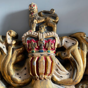 A magnificent, large cast Royal Coat of Arms centred by a crown with lion surmounted and flanked by the lion and unicorn supporting the shield. With foliate surrounded ribbon raised and carrying the motto of the monarch of the United Kingdom, 'Dieu et mon droit' meaning 'God and my right' - SHOP NOW - www.intovintage.co.uk