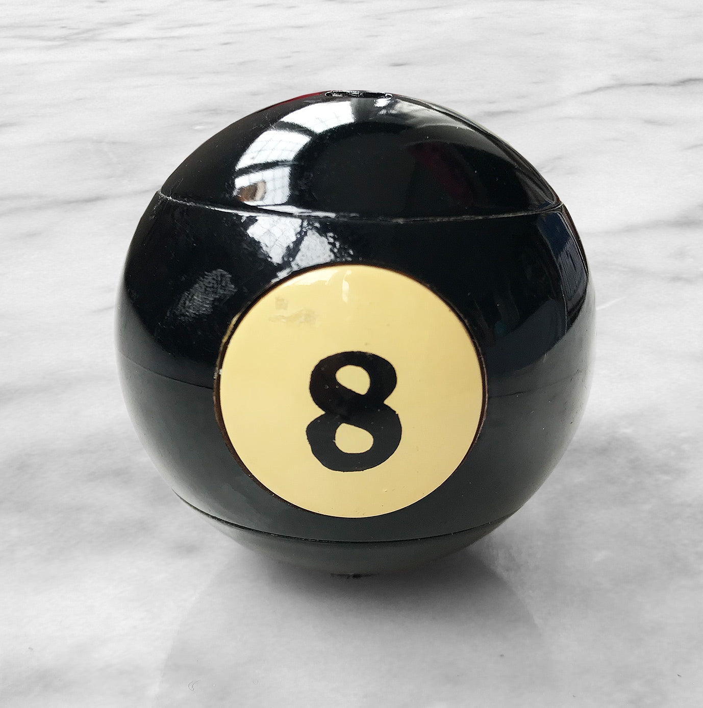 Quirky 8 ball lighter.
