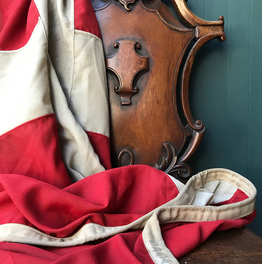 A Large Vintage Danish Flag. Marked 'Danmark' on the seem that also has a cast metal fastener. These flags look great framed and hung on the wall or, use it as a cool through or table cloth! - SHOP NOW - www.intovintage.co.uk