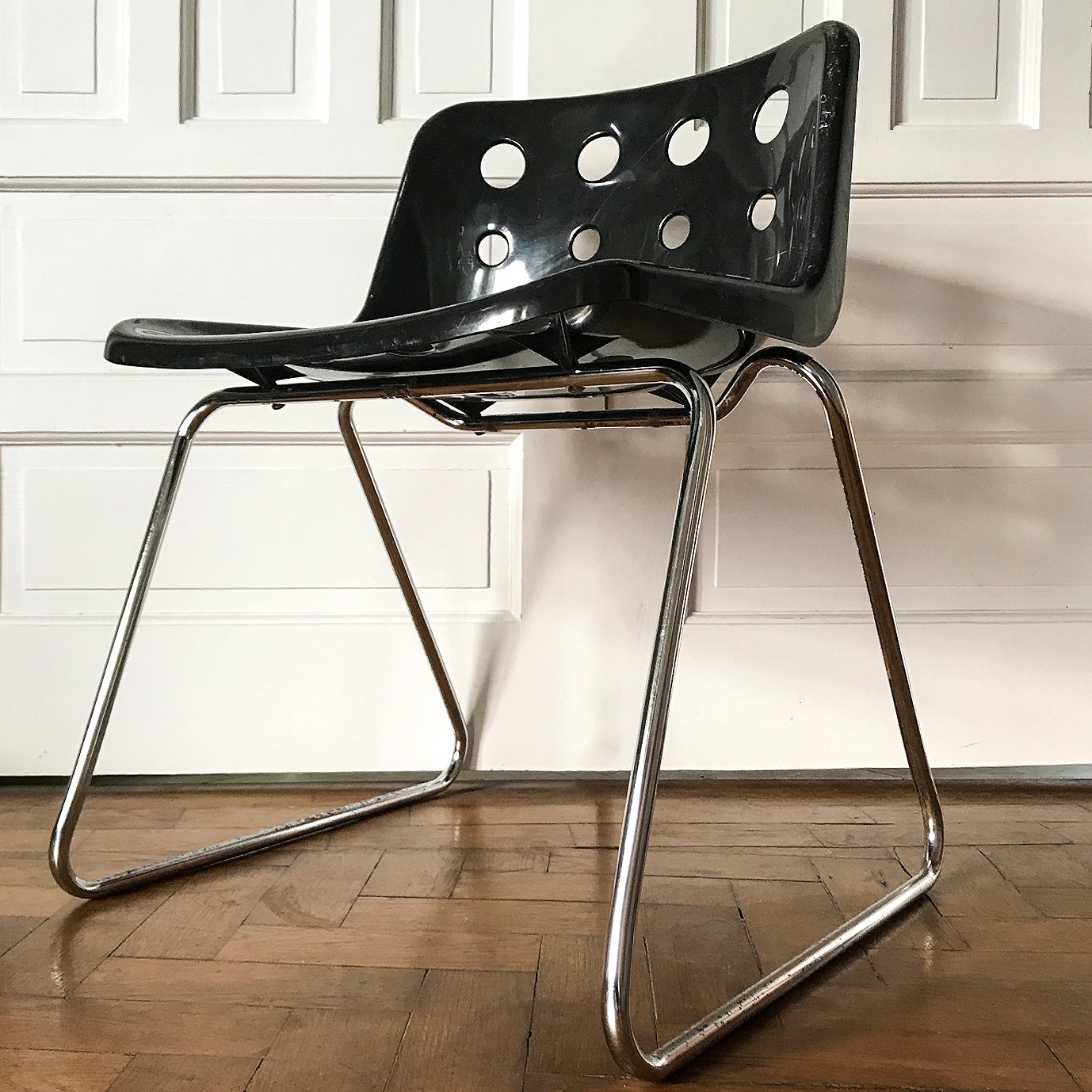 Original Robin Day for Hille of London ‘Polo’ chair designed in 1975 with chromed steel rod skid base and pierced polypropylene shell-black seat - SHOP NOW - www.intovintage.co.uk