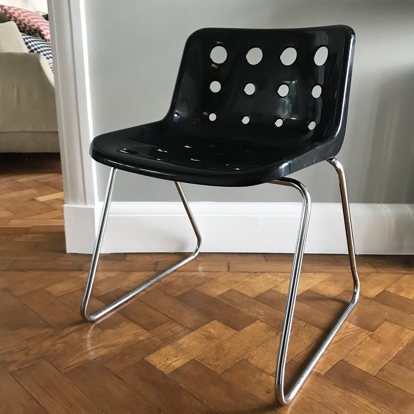 Original Robin Day for Hille of London ‘Polo’ chair designed in 1975 with chromed steel rod skid base and pierced polypropylene shell-black seat - SHOP NOW - www.intovintage.co.uk