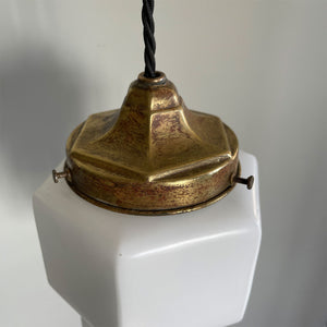 This Art Deco Odeon Style Pendant lamp oozes 30's style with its stepped geometric opaline shade and brass gallery, bringing a sense of deco glamour to any porch or hallway it is hung in. It has new braided black flex and new brass bayonet fitting inside - SHOP NOW - www.intovintage.co.uk