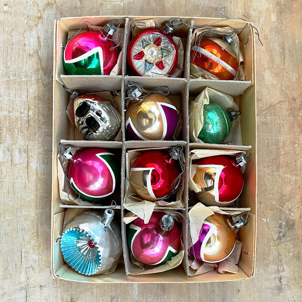 An original box of 1950’s Christmas Baubles. 12 brightly coloured vintage baubles, eleven glass and one plastic - SHOP NOW - www.intovintage.co.uk