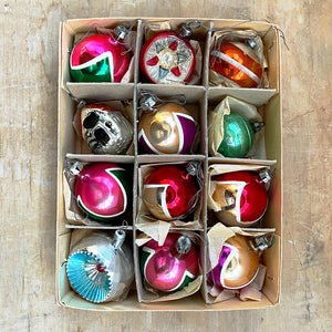 An original box of 1950’s Christmas Baubles. 12 brightly coloured vintage baubles, eleven glass and one plastic - SHOP NOW - www.intovintage.co.uk