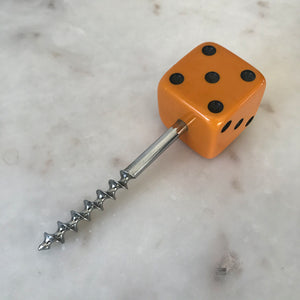 Three deep orange vintage dice all doing a job... One sits atop your bottle replacing the cork, pull off the dice and it becomes a pourer. The second dice is your corkscrew whilst the third dice opens your beer bottles - SHOP NOW - www.intovintage.co.uk