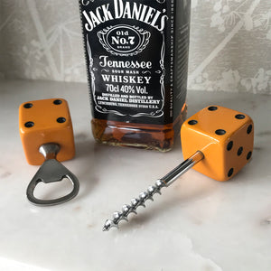 Three deep orange vintage dice all doing a job... One sits atop your bottle replacing the cork, pull off the dice and it becomes a pourer. The second dice is your corkscrew whilst the third dice opens your beer bottles - SHOP NOW - www.intovintage.co.uk