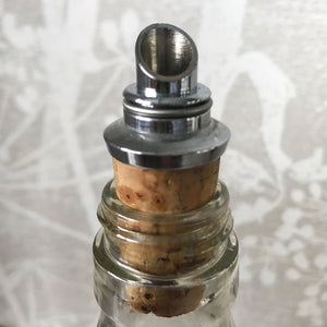 Three deep orange vintage dice all doing a job... One sits atop your bottle replacing the cork, pull off the dice and it becomes a pourer. The second dice is your corkscrew whilst the third dice opens your beer bottles - SHOP NOW - www.intovintage.co.uk