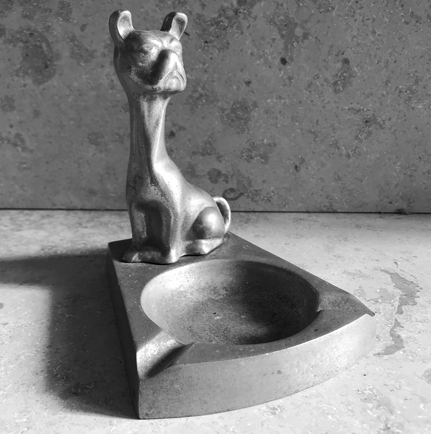 Cool vintage French Bulldog ashtray, probably from the 30's/40's. The pooch sits upright and proud on the edge of the bowl - SHOP NOW- www.intovintage.co.uk