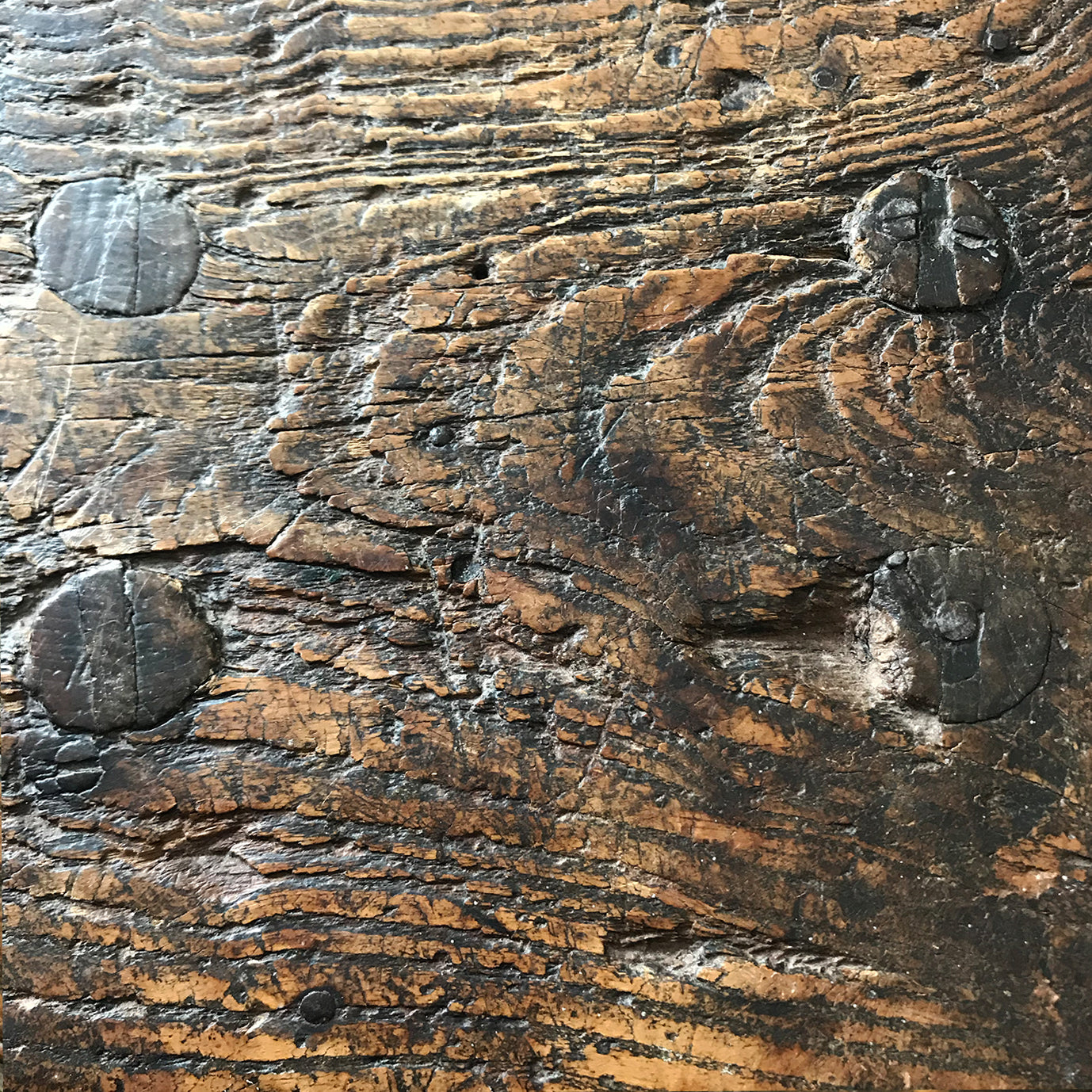 A very old Antique hand carved Elm Milking Stool with wonder colour and wear to the woods surface. Very solid and sitting on four tapered straight edged legs. The seat itself has a great depth to it with pegs and driven wedges. A beautiful piece -SHOP NOW - www.intovintage.co.uk