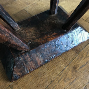 A very old Antique hand carved Elm Milking Stool with wonder colour and wear to the woods surface. Very solid and sitting on four tapered straight edged legs. The seat itself has a great depth to it with pegs and driven wedges. A beautiful piece -SHOP NOW - www.intovintage.co.uk