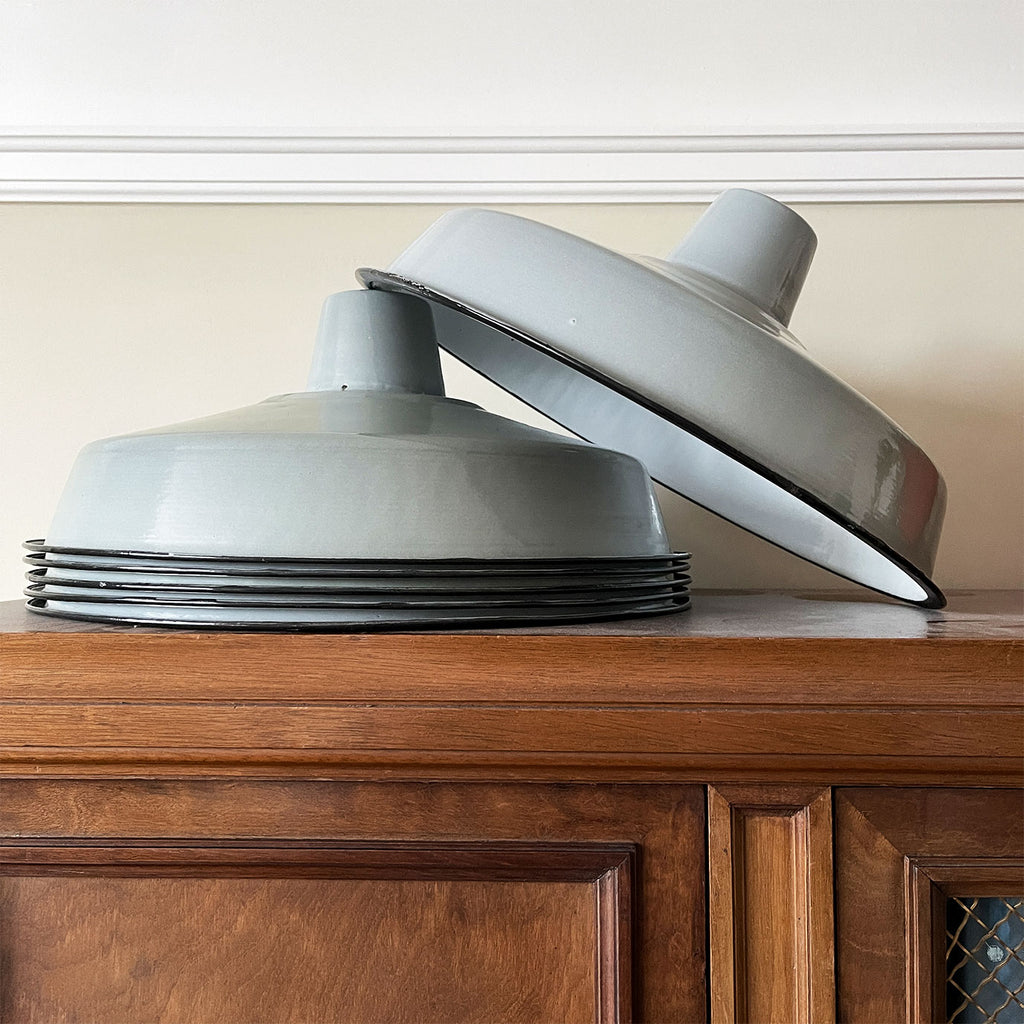 A run of six nice & clean smart grey enamel shades. The inner shade is finished in a white enamel. Great for for the kitchen. We have six of these lights available - SHOP NOW - www.intovintage.co.uk