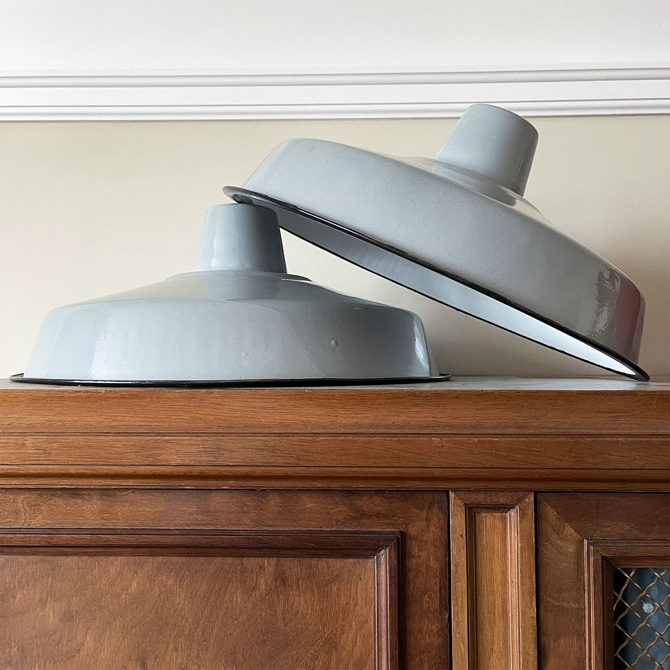 A run of six nice & clean smart grey enamel shades. The inner shade is finished in a white enamel. Great for for the kitchen. We have six of these lights available - SHOP NOW - www.intovintage.co.uk