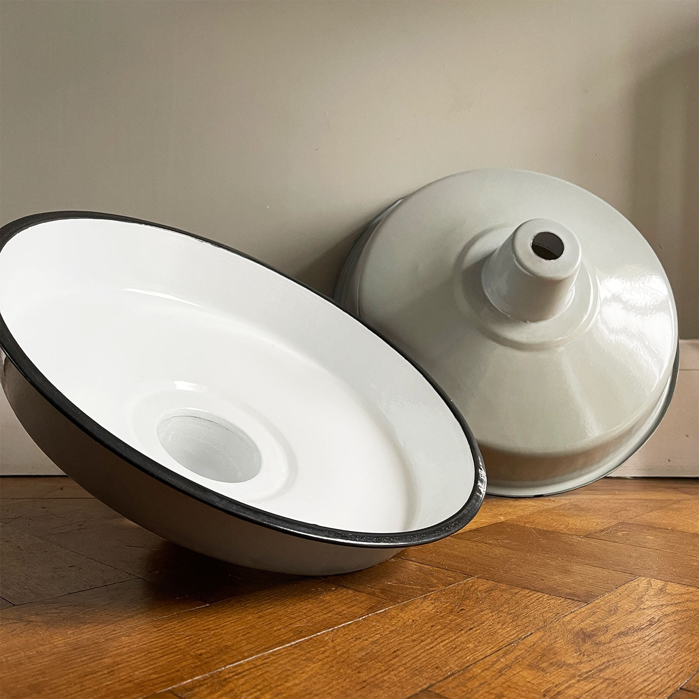 A run of six nice & clean smart grey enamel shades. The inner shade is finished in a white enamel. Great for for the kitchen. We have six of these lights available - SHOP NOW - www.intovintage.co.uk