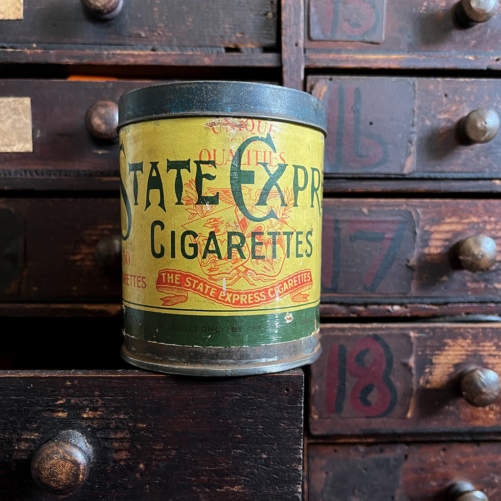A scarce Ardath 'State Express No. 555' Round Cigarette Tin with fantastic period typography to the label and a pressed tin lid. - SHOP NOW - www.intovintage.co.uk