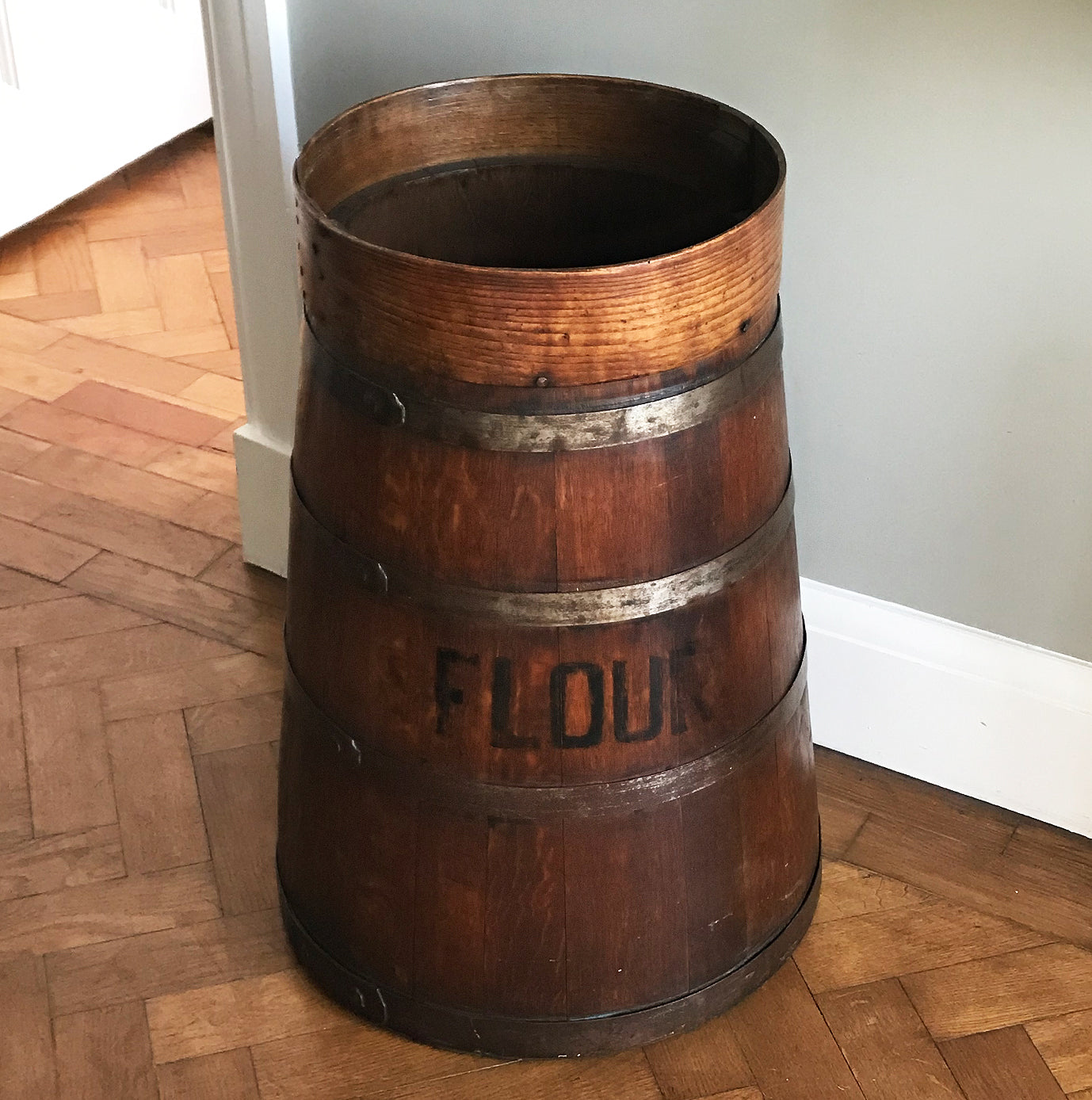 Fantastic Coopered Oak Antique Flour Bin, probably Georgian. A good size bin that tapers to the top and is bound with steel rings. The original aged black lettering is still on the front and the wood has aged to a beautiful mellow golden colour - SHOP NOW - www.intovintage.co.uk