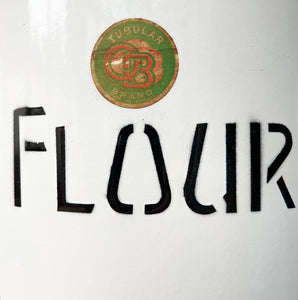 A Vintage Enamel Flour Bin with original 'Tubular Brands' manufacturer sticker. It has great typography to the front. Good looking and very practical if you love to cook - SHOP NOW - www.intovintage.co.uk