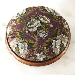 Pretty pair of Edwardian Foot Stools. Veneered mahogany bases with a chevron detail and ceramic feet. The tops are finished in a nicely coloured flower and leaf tapestry material with sewn in beadwork - SHOP NOW - www.intovintage.co.uk
