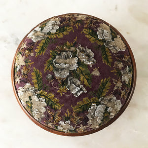 Pretty pair of Edwardian Foot Stools. Veneered mahogany bases with a chevron detail and ceramic feet. The tops are finished in a nicely coloured flower and leaf tapestry material with sewn in beadwork - SHOP NOW - www.intovintage.co.uk