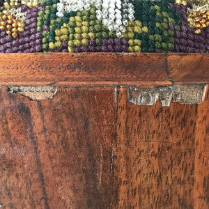 Pretty pair of Edwardian Foot Stools. Veneered mahogany bases with a chevron detail and ceramic feet. The tops are finished in a nicely coloured flower and leaf tapestry material with sewn in beadwork - SHOP NOW - www.intovintage.co.uk