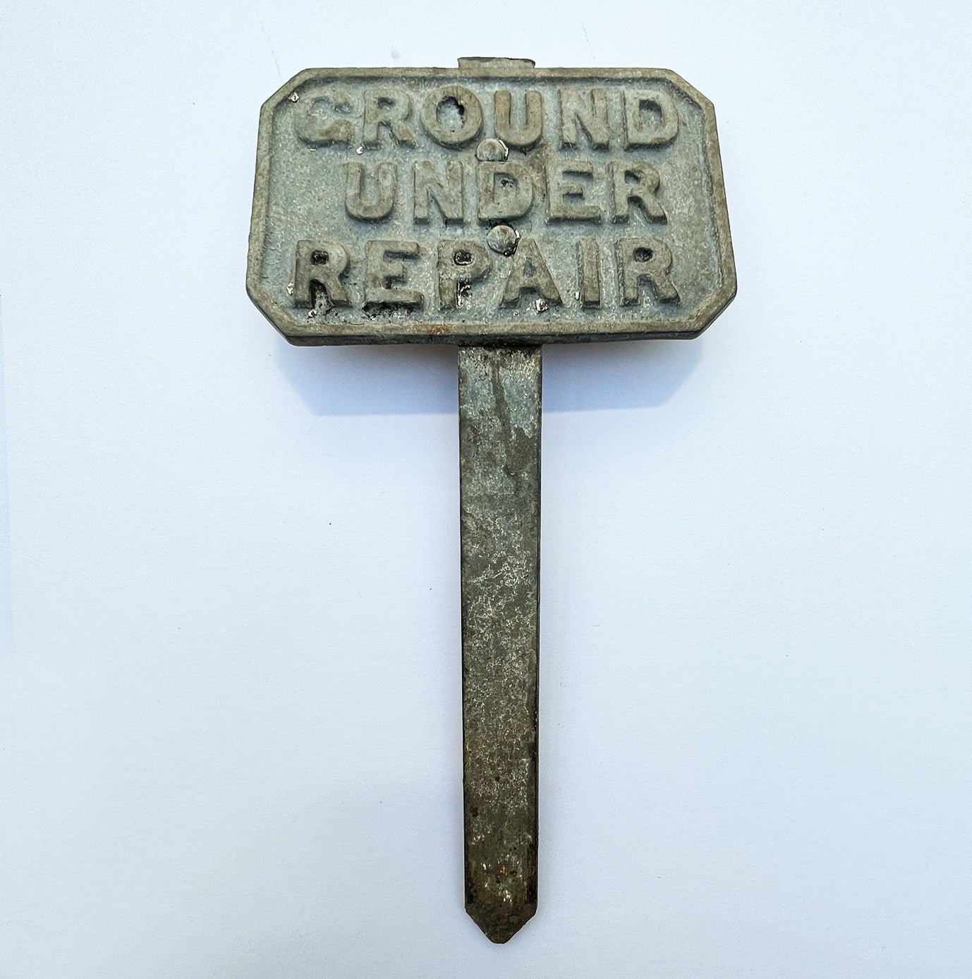 A quality shaped heavy cast galvanised sign reading ‘Ground Under Repair’ survives from the early to middle part of the twentieth century. It more than likely came from a golf course. The perfect gift for the avid gardener - SHOP NOW - www.intovintage.co.uk