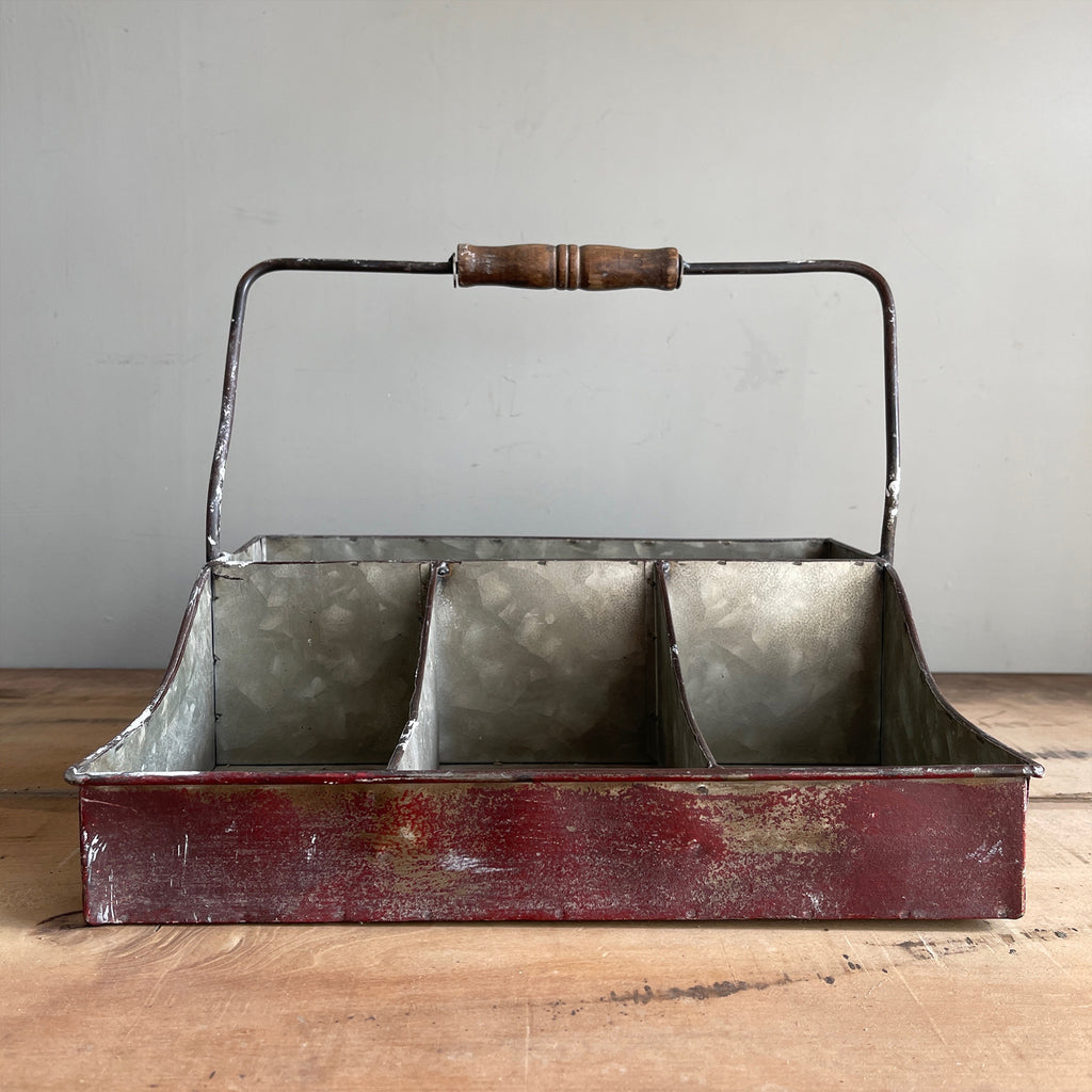 A practical Industrial Trug in an attractive time worn burgundy finish. The tray has four handy compartments ideal for keeping your condiments tidy on the dining table. Good looking and useful too - SHOP NOW - www.intovintage.co.uk