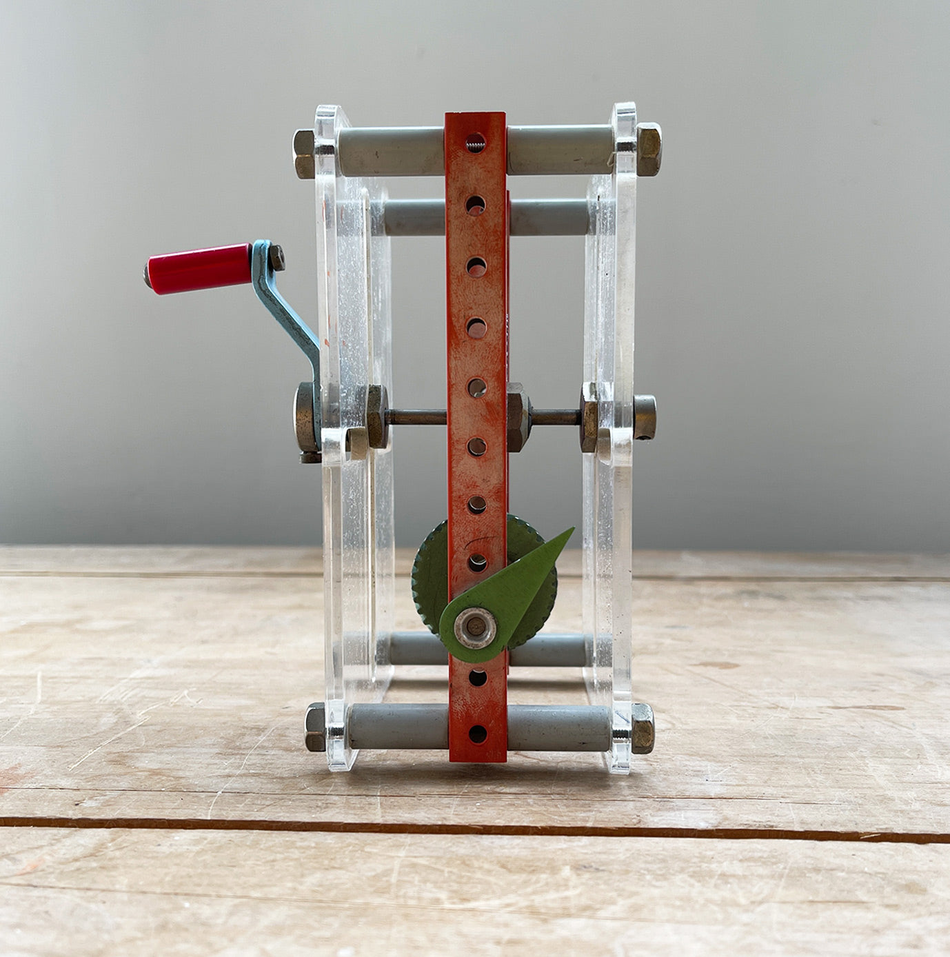A Vintage Mechanical Teaching Aid that shows the mechanics of gears. Turning the little handle rotates a cog that in turn, turns another smaller cog which rotates a green arrow - SHOP NOW - www.intovintage.co.uk