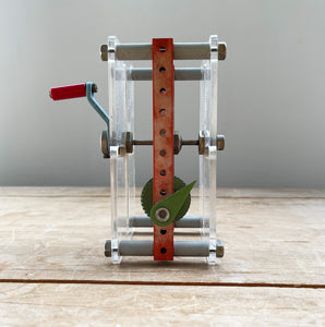 A Vintage Mechanical Teaching Aid that shows the mechanics of gears. Turning the little handle rotates a cog that in turn, turns another smaller cog which rotates a green arrow - SHOP NOW - www.intovintage.co.uk