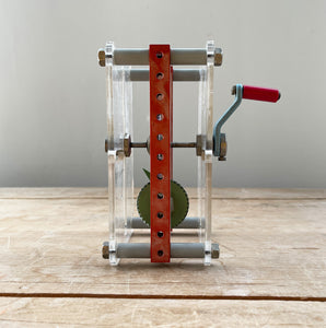 A Vintage Mechanical Teaching Aid that shows the mechanics of gears. Turning the little handle rotates a cog that in turn, turns another smaller cog which rotates a green arrow - SHOP NOW - www.intovintage.co.uk