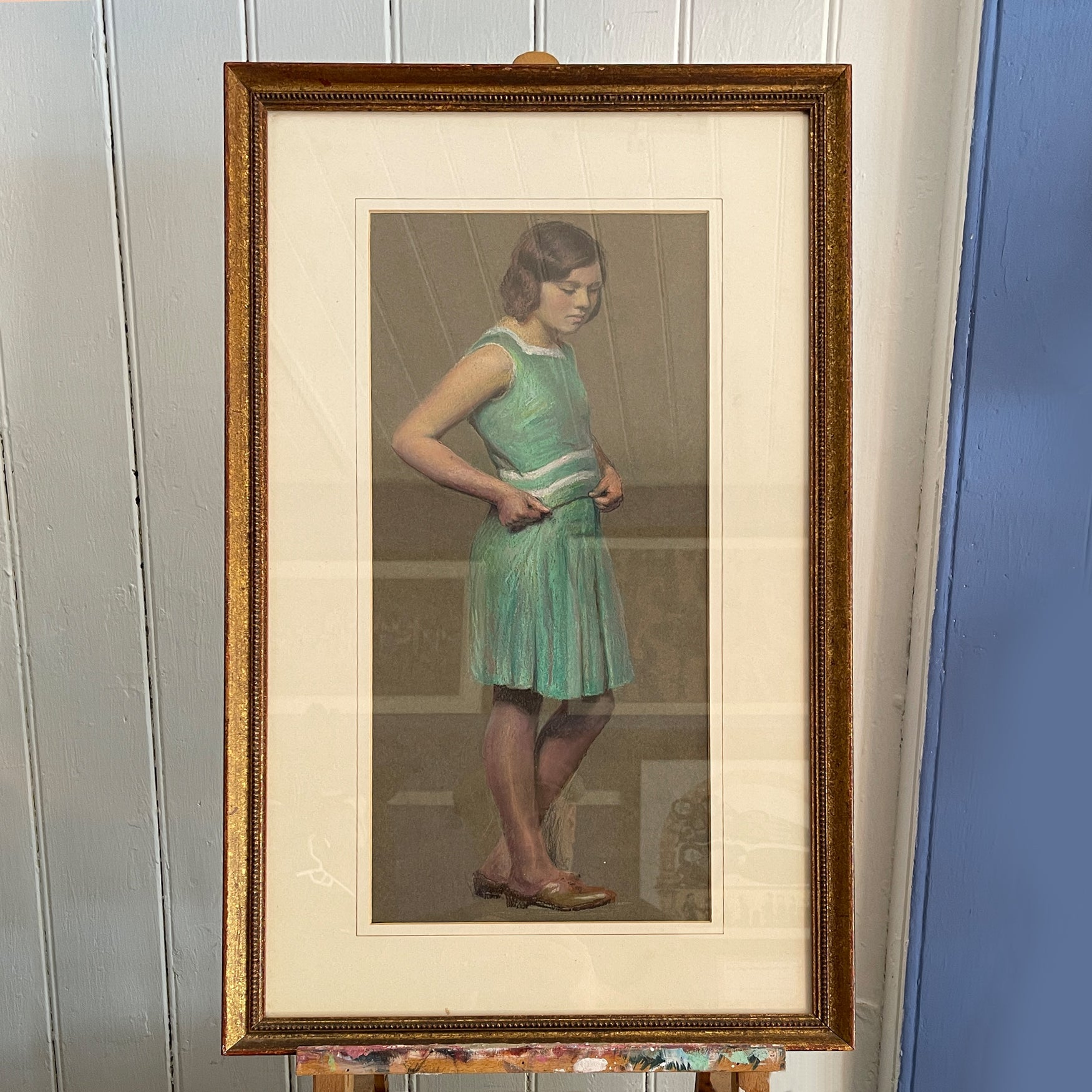 A beautiful pastil study of a young girl c.1930. She wears a simple dress in a bright duck egg with white stripes. Extremely elegant and of the time - SHOP NOW - www.intovintage.co.uk