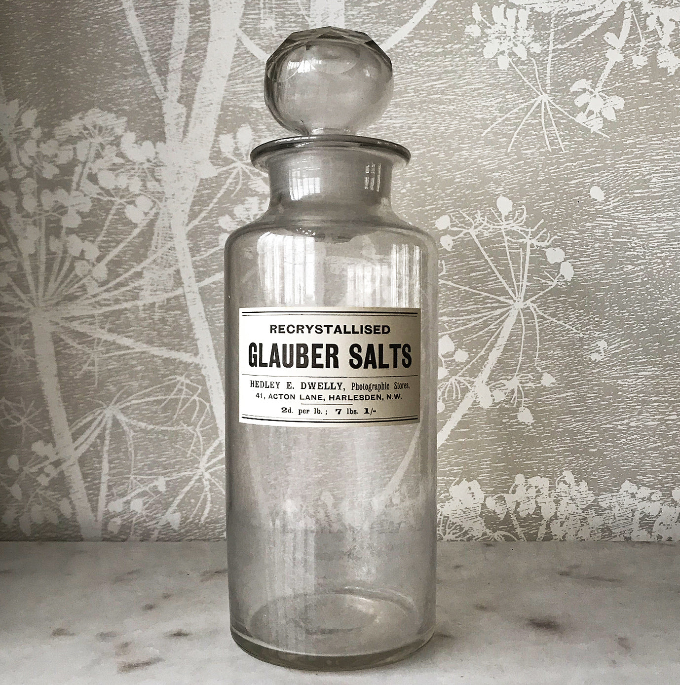 Vintage Clear Apothecary Bottle with an original paper label from Hedley E. Dwelly, High-Class Drug Stores, 41, Acton Lane, Harlesden. N.W. London - SHOP NOW - www.intovintage.co.uk