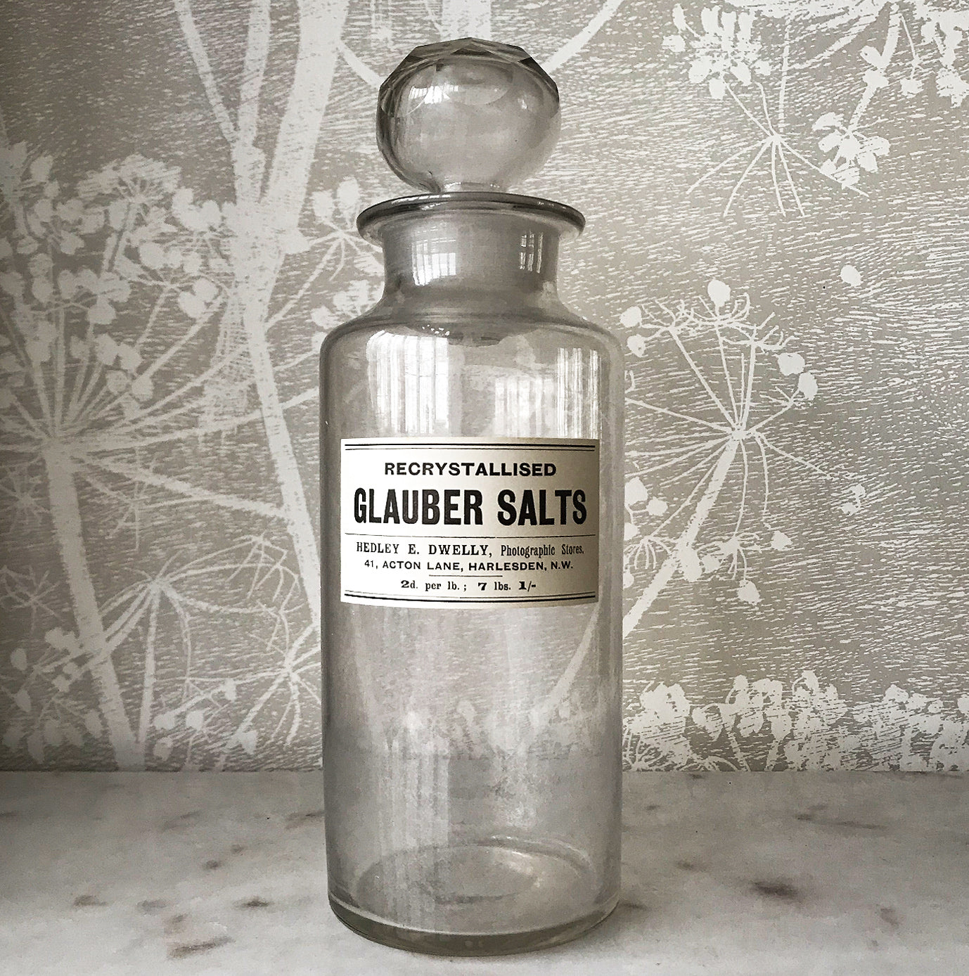 Vintage Clear Apothecary Bottle with an original paper label from Hedley E. Dwelly, High-Class Drug Stores, 41, Acton Lane, Harlesden. N.W. London - SHOP NOW - www.intovintage.co.uk