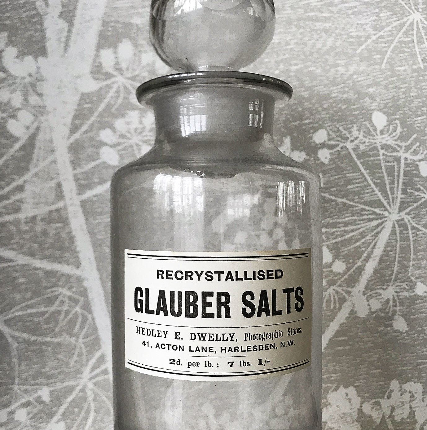 Vintage Clear Apothecary Bottle with an original paper label from Hedley E. Dwelly, High-Class Drug Stores, 41, Acton Lane, Harlesden. N.W. London - SHOP NOW - www.intovintage.co.uk