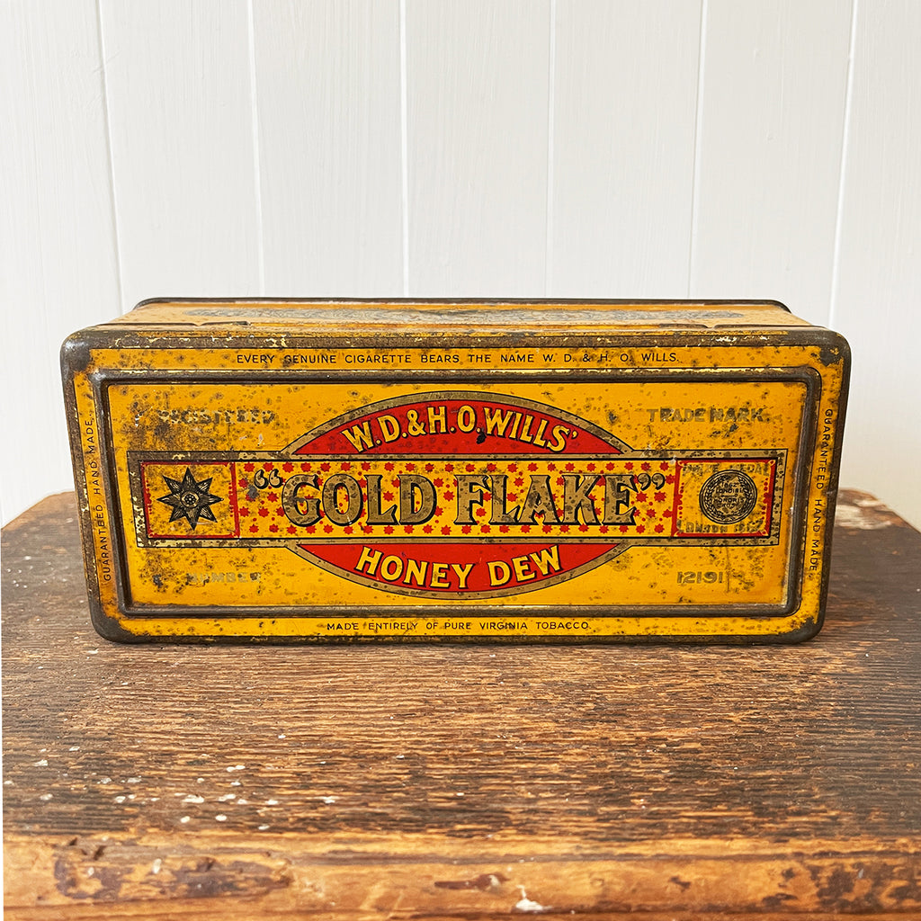 Vintage Gold Flake Honey Dew Tobacco Tin from W.D & H.O Wills. Great colourful graphics to the front, sides with drilled air holes as part of the tin design - SHOP NOW - www.intovintage.co.uk