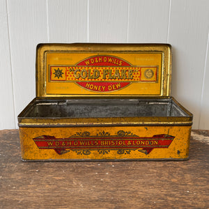 Vintage Gold Flake Honey Dew Tobacco Tin from W.D & H.O Wills. Great colourful graphics to the front, sides with drilled air holes as part of the tin design - SHOP NOW - www.intovintage.co.uk
