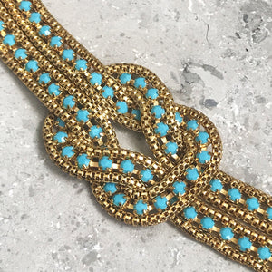 Gold Tone & Duck Egg Blue Stone Knot Bracelet