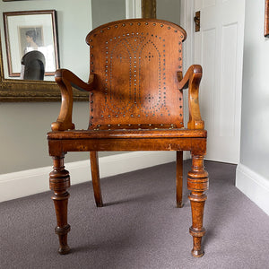 The sturdy Oak frame, raised on turned legs and arm supports with swept rear legs and curved Gothic inspired bent wood & drill pierced with brass studded backrest The seat has a drilled star motif to the seat and again is brass studded - SHOP NOW - www.intovintage.co.uk