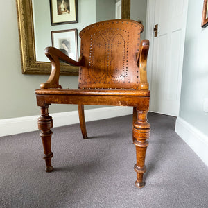 The sturdy Oak frame, raised on turned legs and arm supports with swept rear legs and curved Gothic inspired bent wood & drill pierced with brass studded backrest The seat has a drilled star motif to the seat and again is brass studded - SHOP NOW - www.intovintage.co.uk