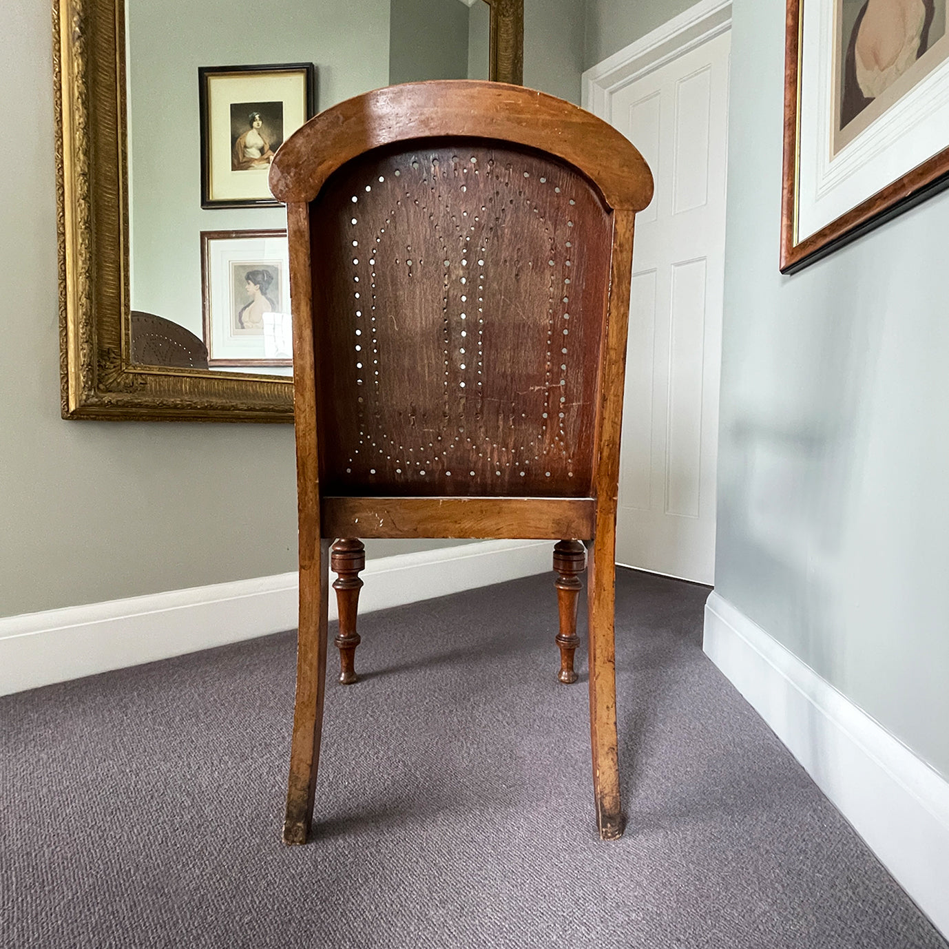 The sturdy Oak frame, raised on turned legs and arm supports with swept rear legs and curved Gothic inspired bent wood & drill pierced with brass studded backrest The seat has a drilled star motif to the seat and again is brass studded - SHOP NOW - www.intovintage.co.uk