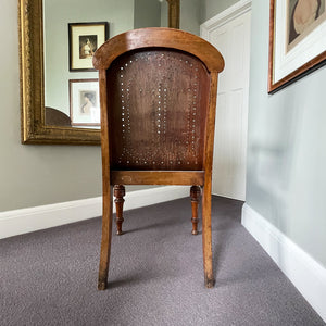 The sturdy Oak frame, raised on turned legs and arm supports with swept rear legs and curved Gothic inspired bent wood & drill pierced with brass studded backrest The seat has a drilled star motif to the seat and again is brass studded - SHOP NOW - www.intovintage.co.uk